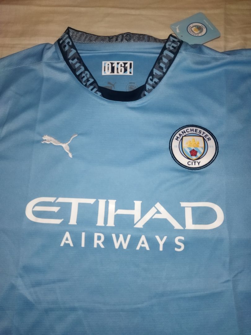 https://www.billigefotballshop.com/wp-content/uploads/2024/11/manchester-city-drakt-barn.jpg